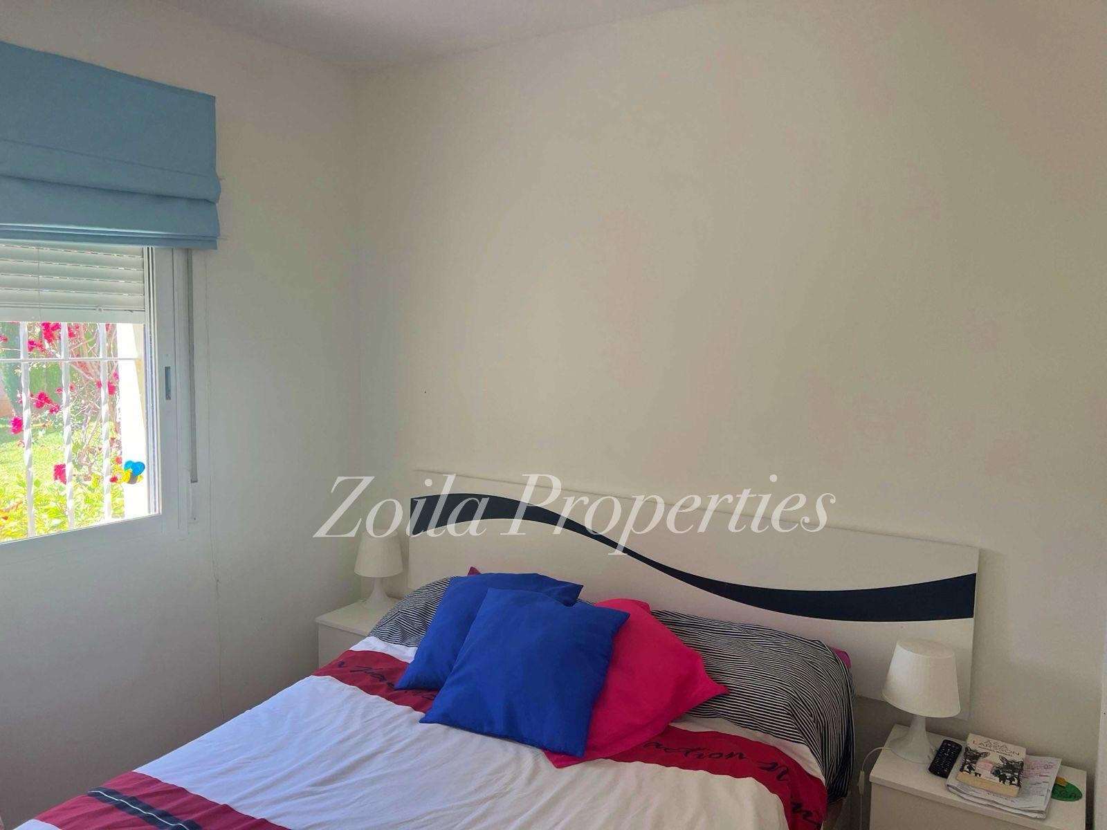 Apartamento bajo esquina en primer linea.